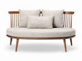Mid-century modern curved sofa with wooden frame and three cushions